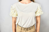 T-SHIRT CON MANICHE A FIORI