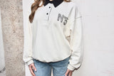 Felpa polo con strass blu o panna